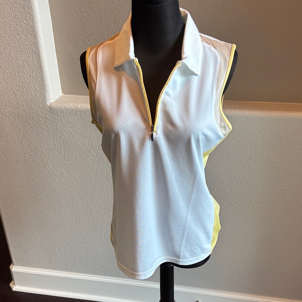 Izod cool FX Sleeveless golf shirt Size M
Polyester.